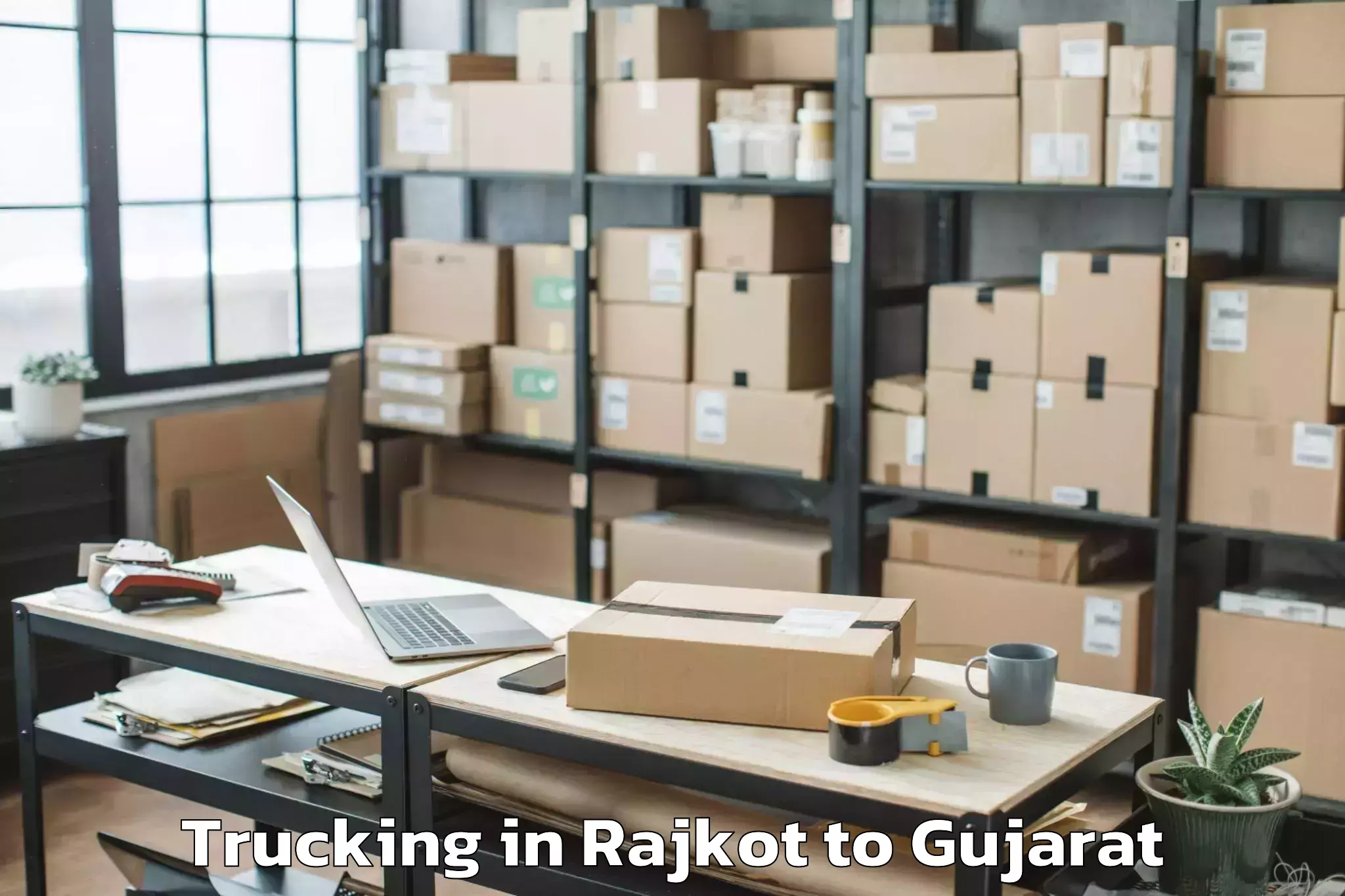 Affordable Rajkot to Hansot Trucking